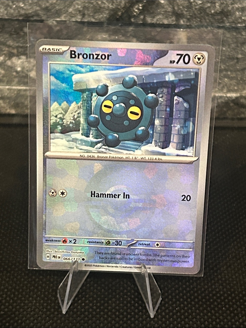 Pokemon Bronzor Pokeball‎ 066/131 Holo from Prismatic Evolutions M/NM